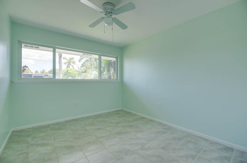 1006 16th Terrace Key West, FL 33040 - Photo 18 of 49 an empty room with a window