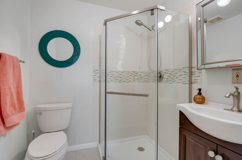 1006 16th Terrace Key West, FL 33040 - Photo 28 of 49 a bathroom with a sink a toilet and a mirror