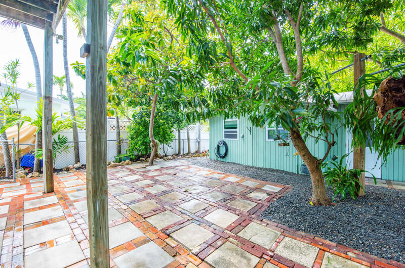 1006 16th Terrace Key West, FL 33040 - Photo 33 of 49 a view of a backyard with plants and large trees