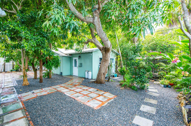 1006 16th Terrace Key West, FL 33040 - Photo 37 of 49 a front view of a house with garden