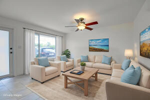 1006 16th Terrace Key West, FL 33040 - Photo 5 of 49 a living room with furniture and a large window
