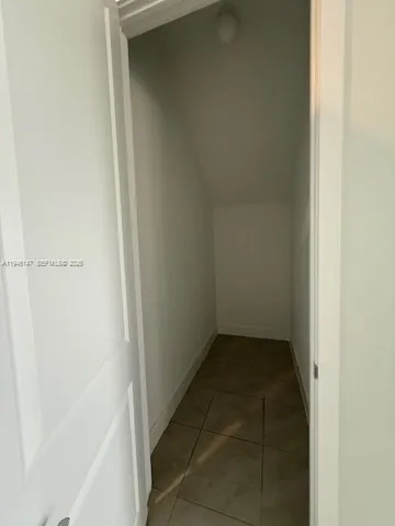 a kitchen with stainless steel appliances granite countertop a refrigerator sink and cabinets