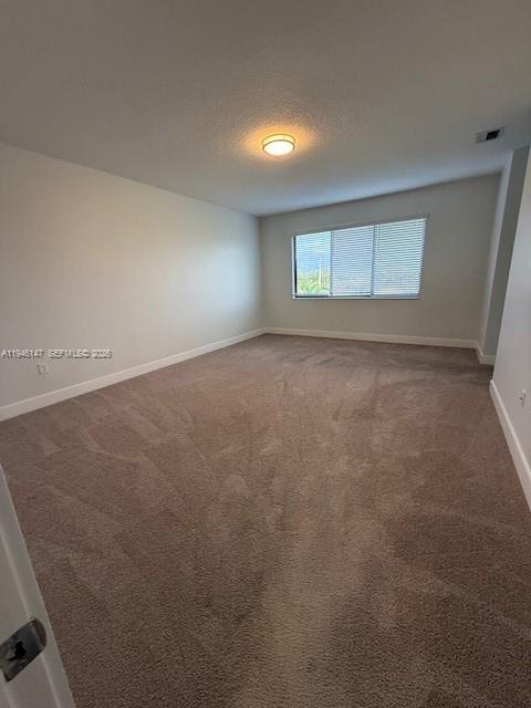4957 Gambero Way Ave Maria, FL 34142 - Photo 20 of 34 an empty room with a empty space and a window