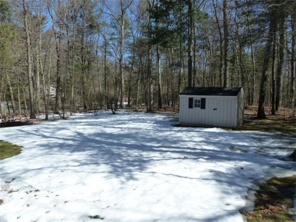 88 Hemlock Road Sudbury, MA 01776 - Photo 24 of 25 a big yard with large trees