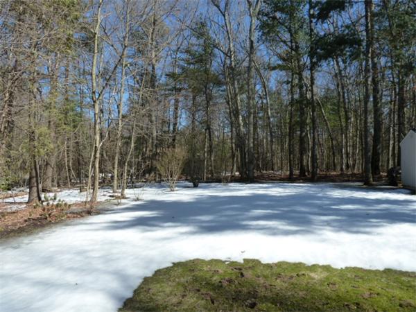 88 Hemlock Road Sudbury, MA 01776 - Photo 25 of 25 a view of a house with a snow on the road