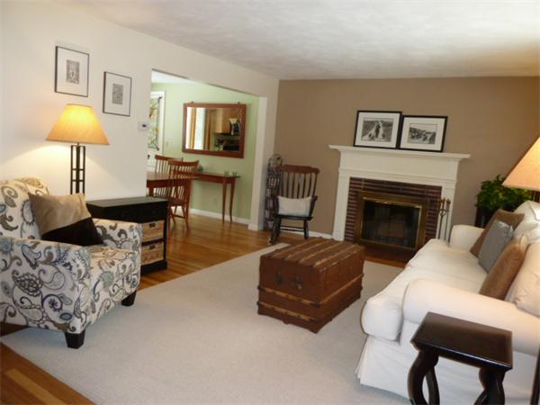 88 Hemlock Road Sudbury, MA 01776 - Photo 3 of 25 a living room with furniture and a fireplace