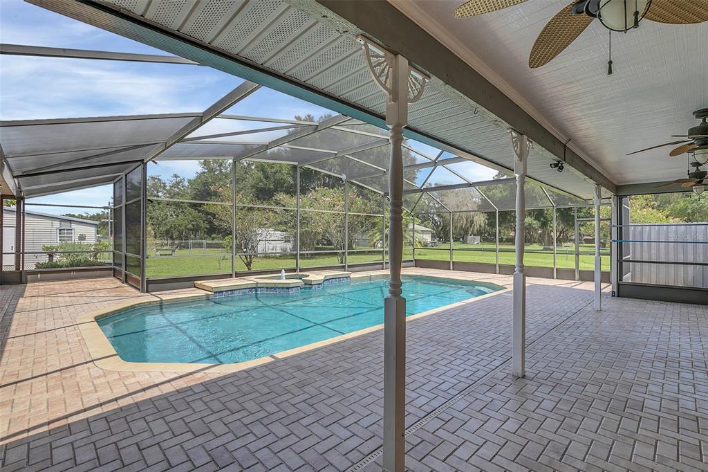 4147 Boggy Creek Road Kissimmee, FL 34744 - Photo 22 of 49 a view of a house with a backyard
