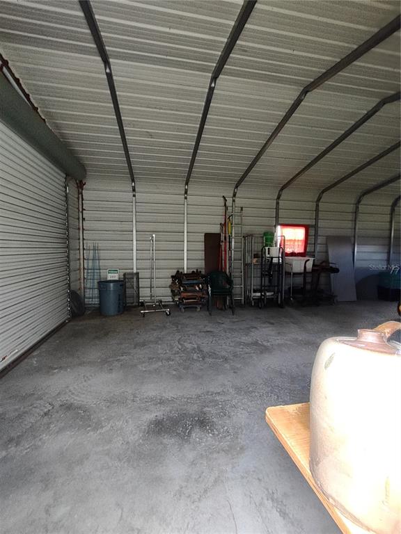 4147 Boggy Creek Road Kissimmee, FL 34744 - Photo 40 of 49 a view of a garage