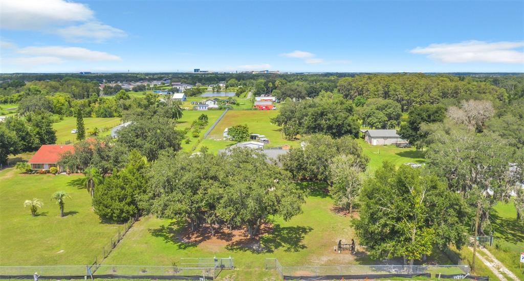 4147 Boggy Creek Road Kissimmee, FL 34744 - Photo 48 of 49 a view of a lake with a city