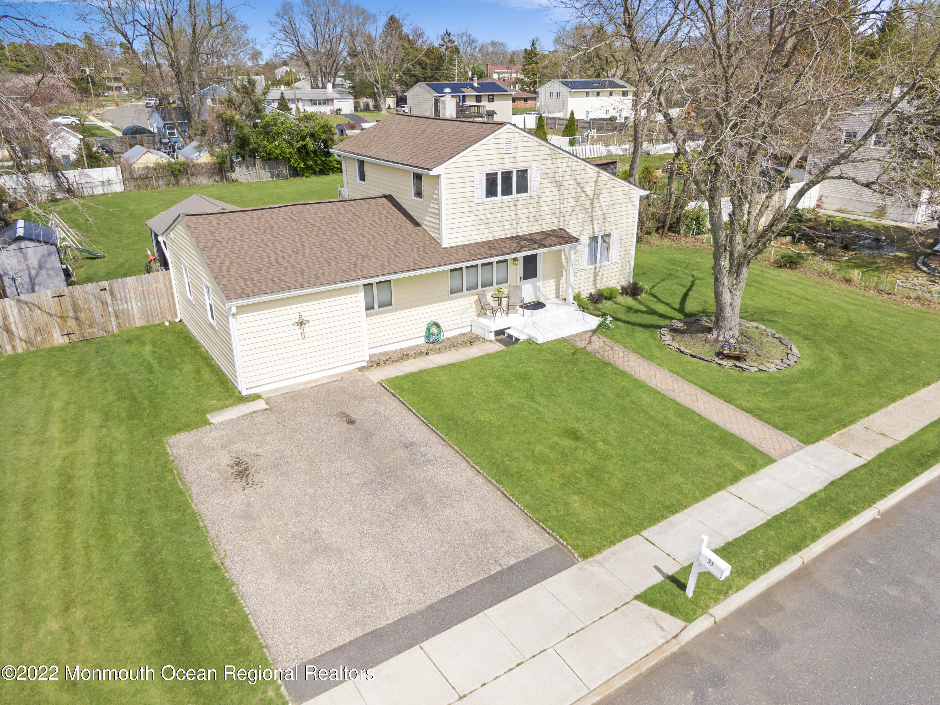 35 Oak Terrace Howell, NJ 07731 - Photo 1 of 27 an aerial view of a house with swimming pool garden and patio