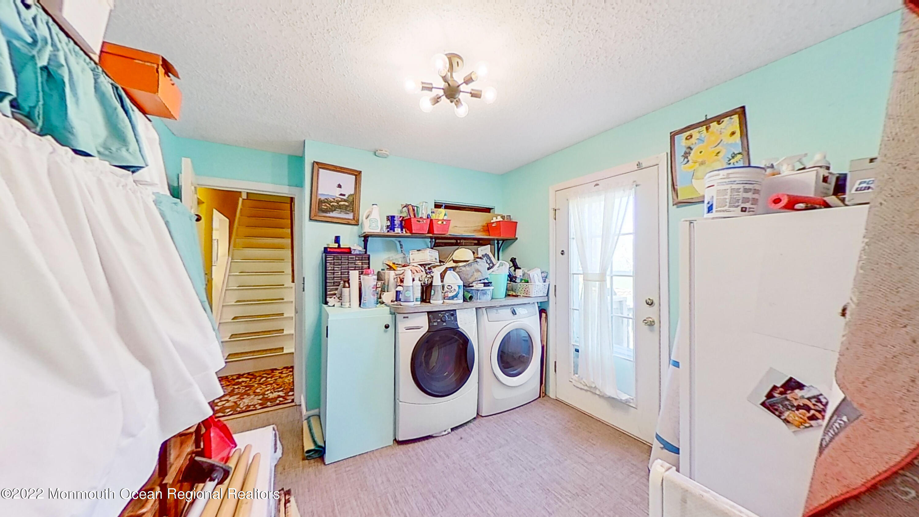35 Oak Terrace Howell, NJ 07731 - Photo 24 of 27 a utility room with fridge and washer
