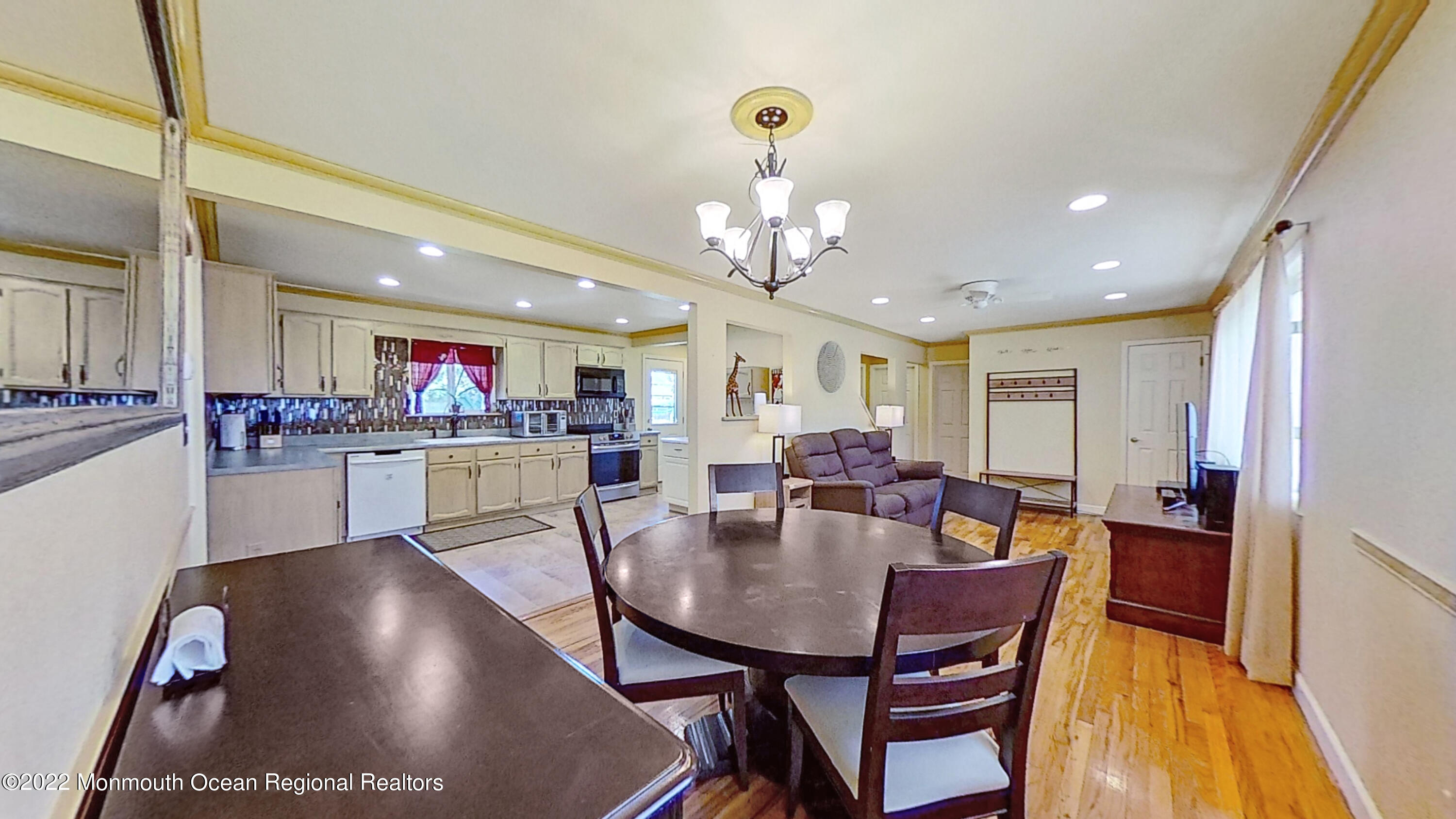 35 Oak Terrace Howell, NJ 07731 - Photo 4 of 27 a living room with dining room and kitchen view