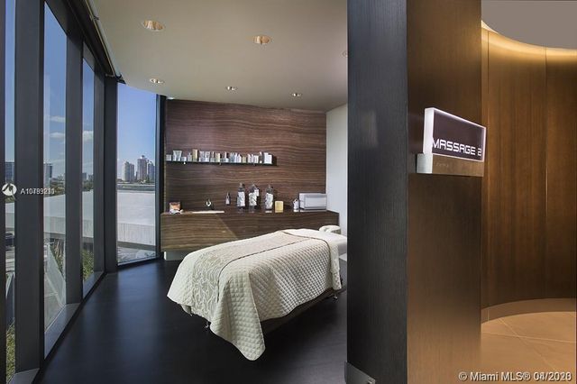 a view of an empty room with windows