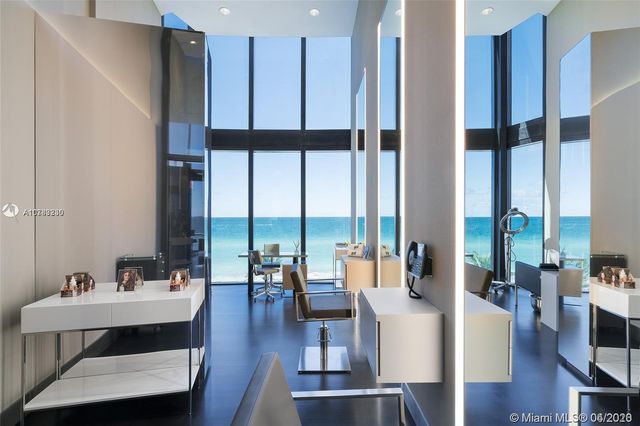 a room with furniture and a potted plant