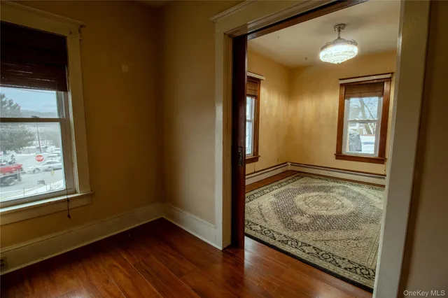 a room with window and a wooden floor