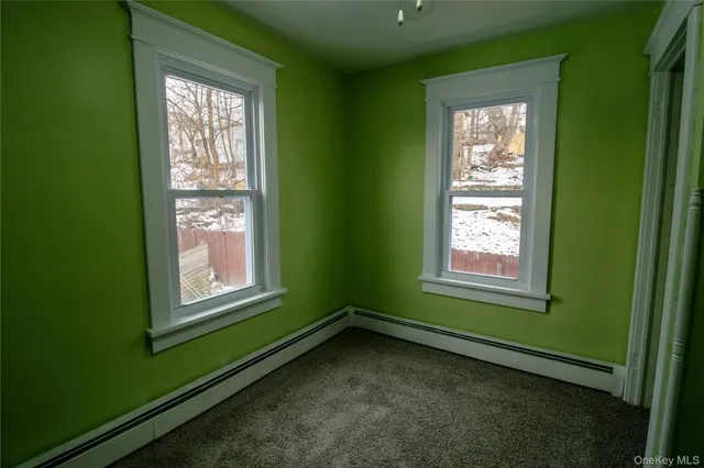 a view of a hallway and entryway of the house
