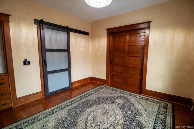 wooden floor and closet in a room