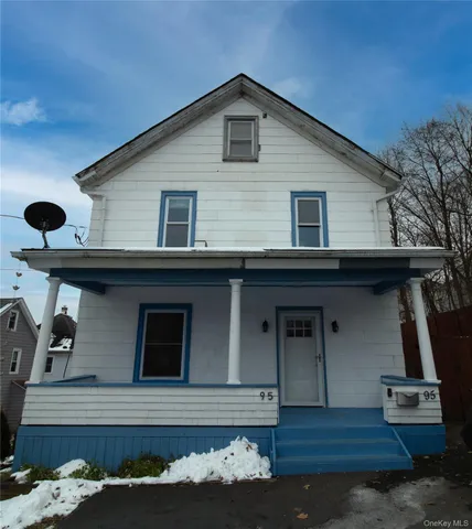 a front view of a house with wooden floor