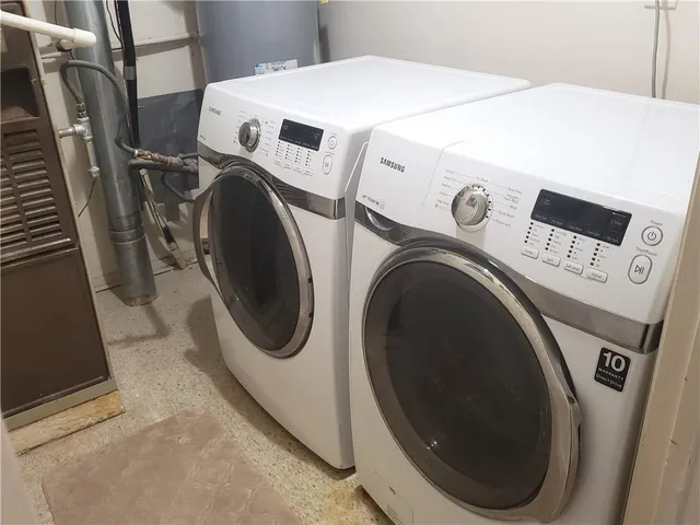a utility room with dryer and washer