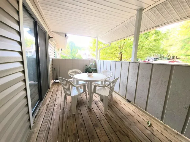 a view of a patio on the roof deck