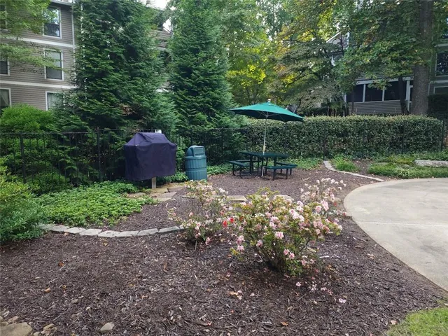 a view of a backyard with a garden