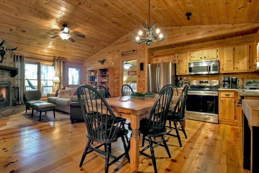 9 Joanna Court Blue Ridge, GA 30513 - Photo 13 of 34 a view of a dining room with furniture and chandelier