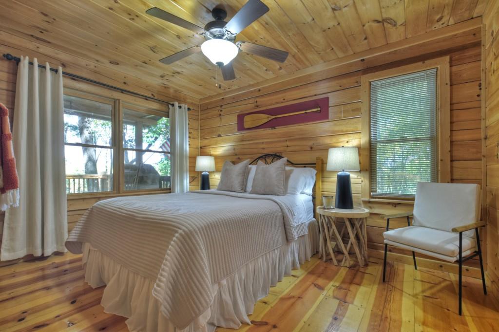 9 Joanna Court Blue Ridge, GA 30513 - Photo 15 of 34 a bed room with a bed and a chair