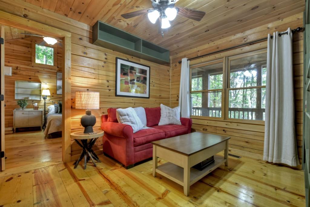 9 Joanna Court Blue Ridge, GA 30513 - Photo 20 of 34 a living room with furniture and a large window