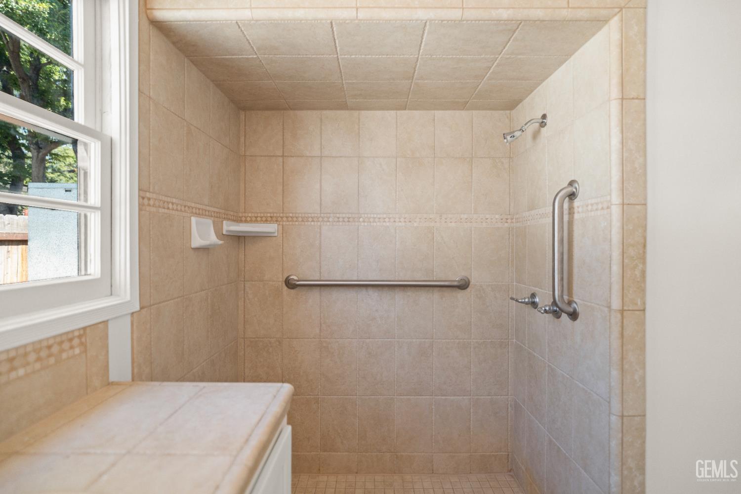 Undisclosed Address Bakersfield, CA 93305 - Photo 20 of 27 a bathroom with a shower