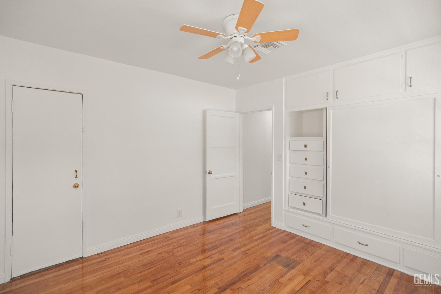 Undisclosed Address Bakersfield, CA 93305 - Photo 22 of 27 wooden floor in an empty room
