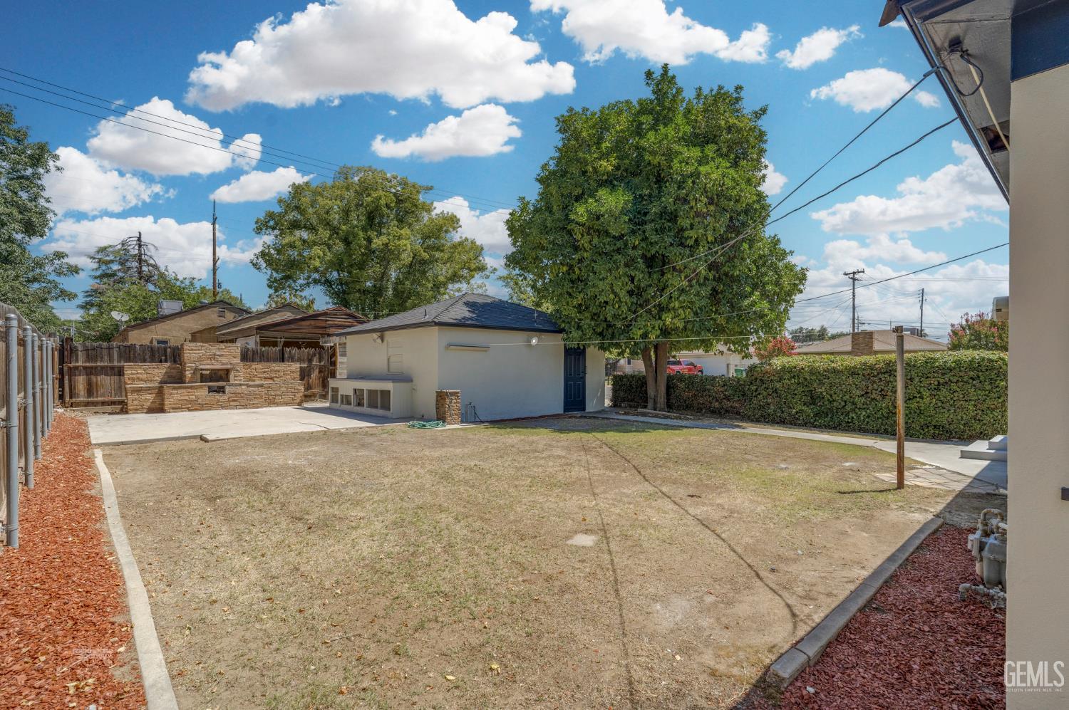 Undisclosed Address Bakersfield, CA 93305 - Photo 24 of 27 a house view with a backyard space