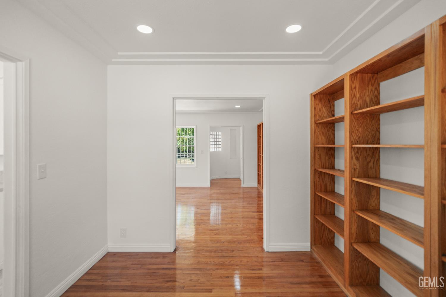 Undisclosed Address Bakersfield, CA 93305 - Photo 9 of 27 a view of an empty room with wooden floor and closet