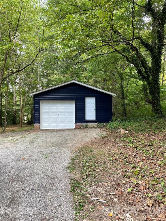 327 Ashbrook Road Salisbury, NC 28147 - Photo 20 of 27 a house with lots of trees