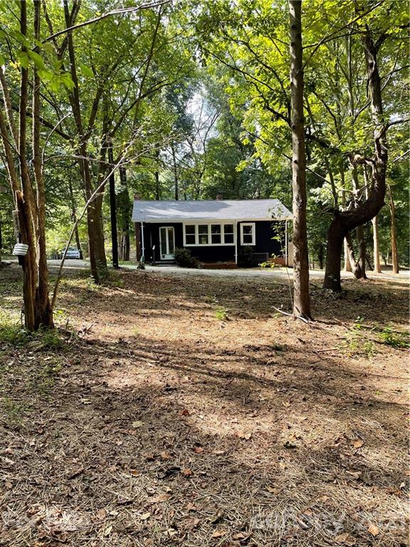327 Ashbrook Road Salisbury, NC 28147 - Photo 25 of 27 a front view of a house with a garden