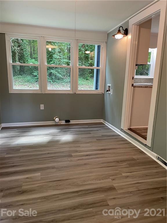 327 Ashbrook Road Salisbury, NC 28147 - Photo 9 of 27 a view of room with window and wooden floor