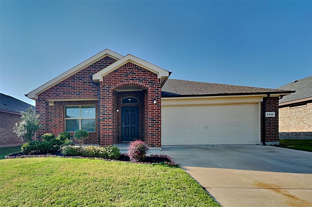 6285 Spring Buck Run Fort Worth, TX 76179 - Photo 1 of 18 a front view of a house with garden