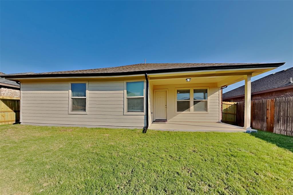 6285 Spring Buck Run Fort Worth, TX 76179 - Photo 17 of 18 front view of house with a yard