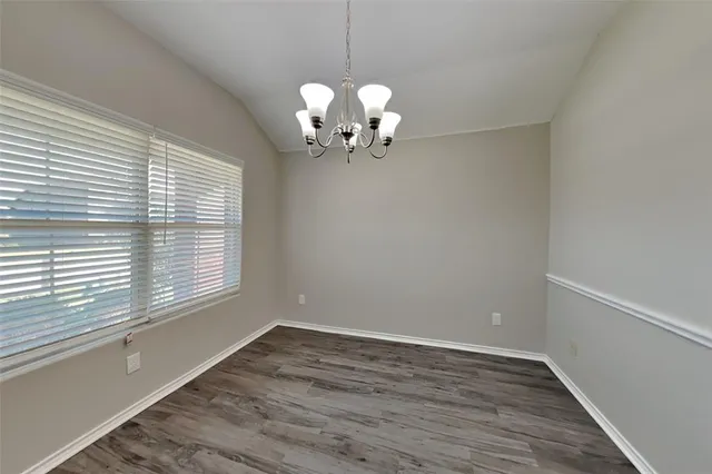 a view of a chandelier in a room