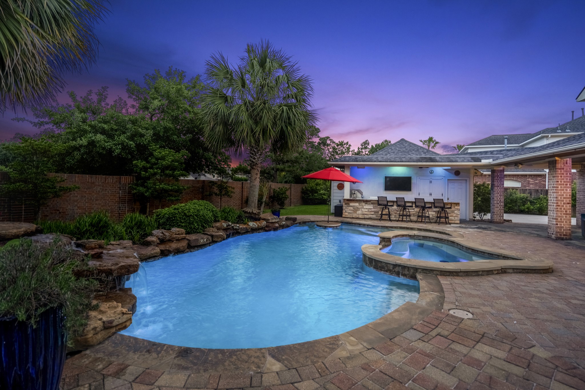 9707 Blue Cruls Way Spring, TX 77379 - Photo 2 of 50 a swimming pool with outdoor seating yard and outdoor seating