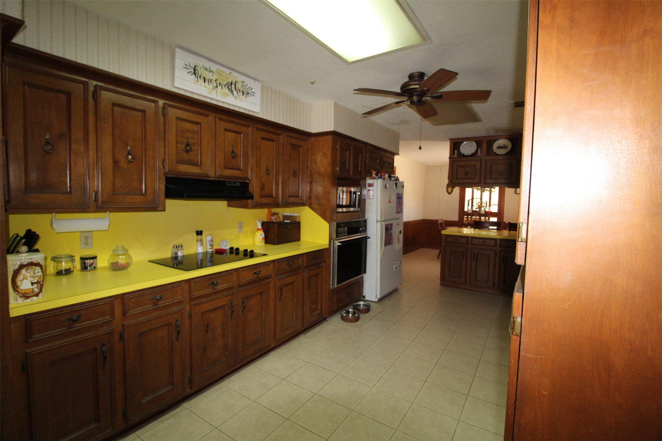 32226 Divot Drive Waller, TX 77484 - Photo 12 of 30 a kitchen with a sink cabinets and window