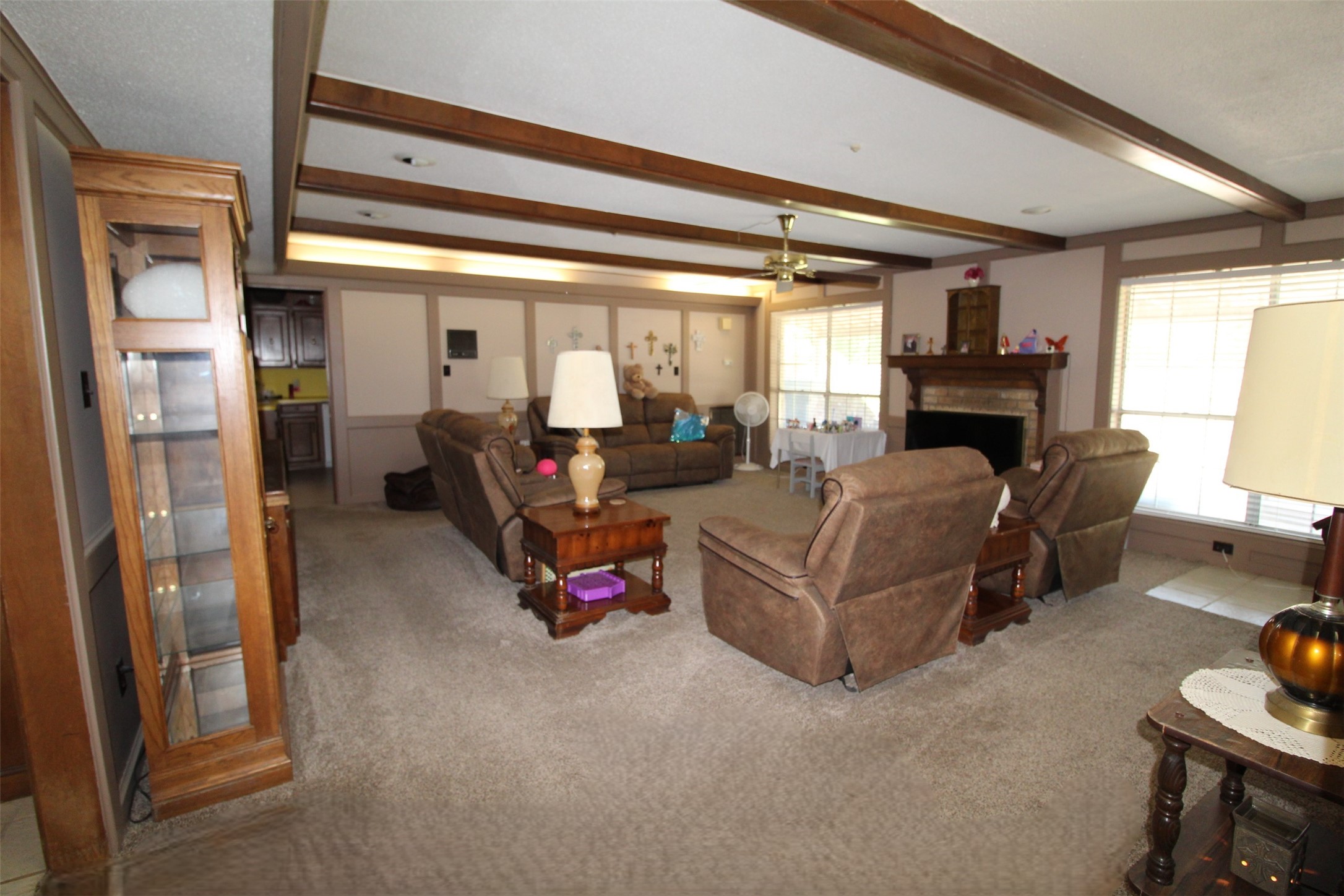 32226 Divot Drive Waller, TX 77484 - Photo 15 of 30 a living room with furniture and a fireplace
