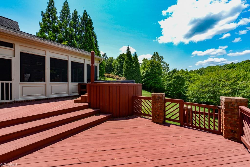 4229 Rock Bridge Road High Point, NC 27262 - Photo 6 of 49 Large deck overlooking grassy yard area