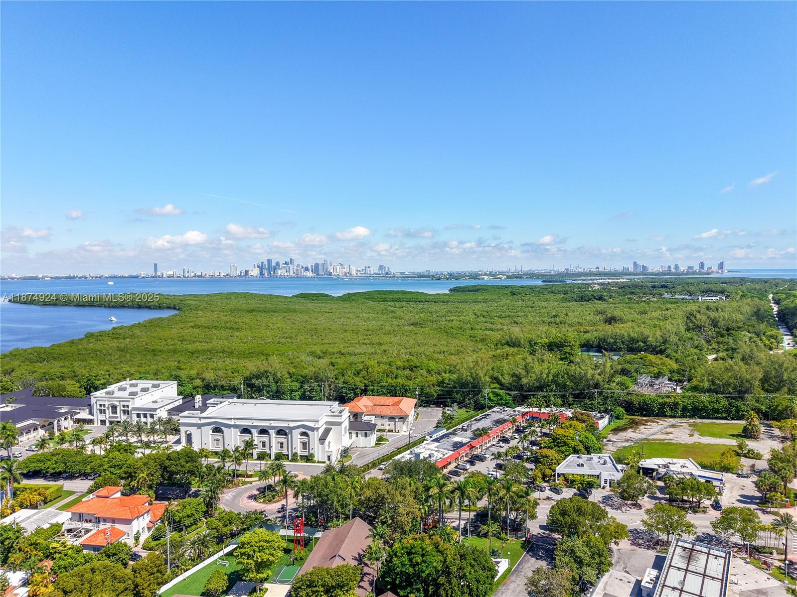 101 Crandon Boulevard, Unit 381 Key Biscayne, FL 33149 - Photo 1 of 16 a view of a city with an ocean