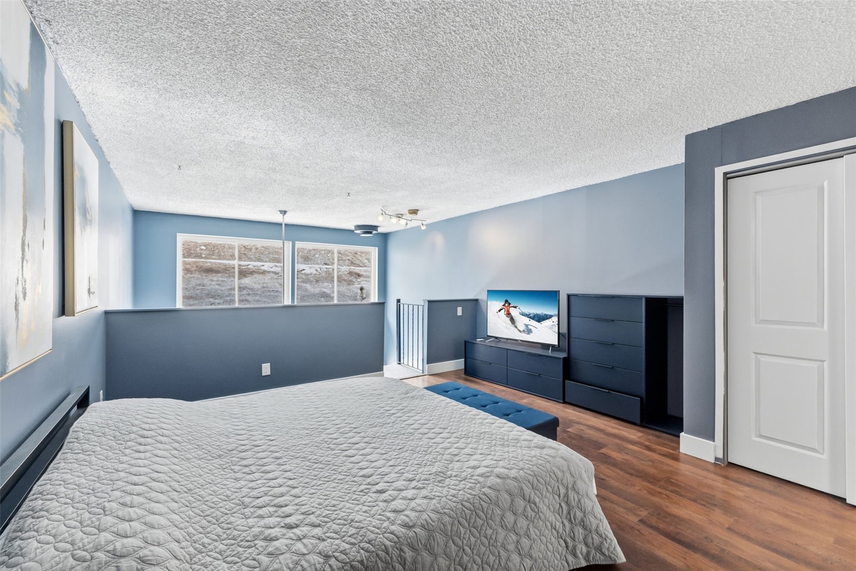 860 Copper Road, Unit 105 Copper Mountain, CO 80443 - Photo 13 of 27 a bedroom with a large bed and a window