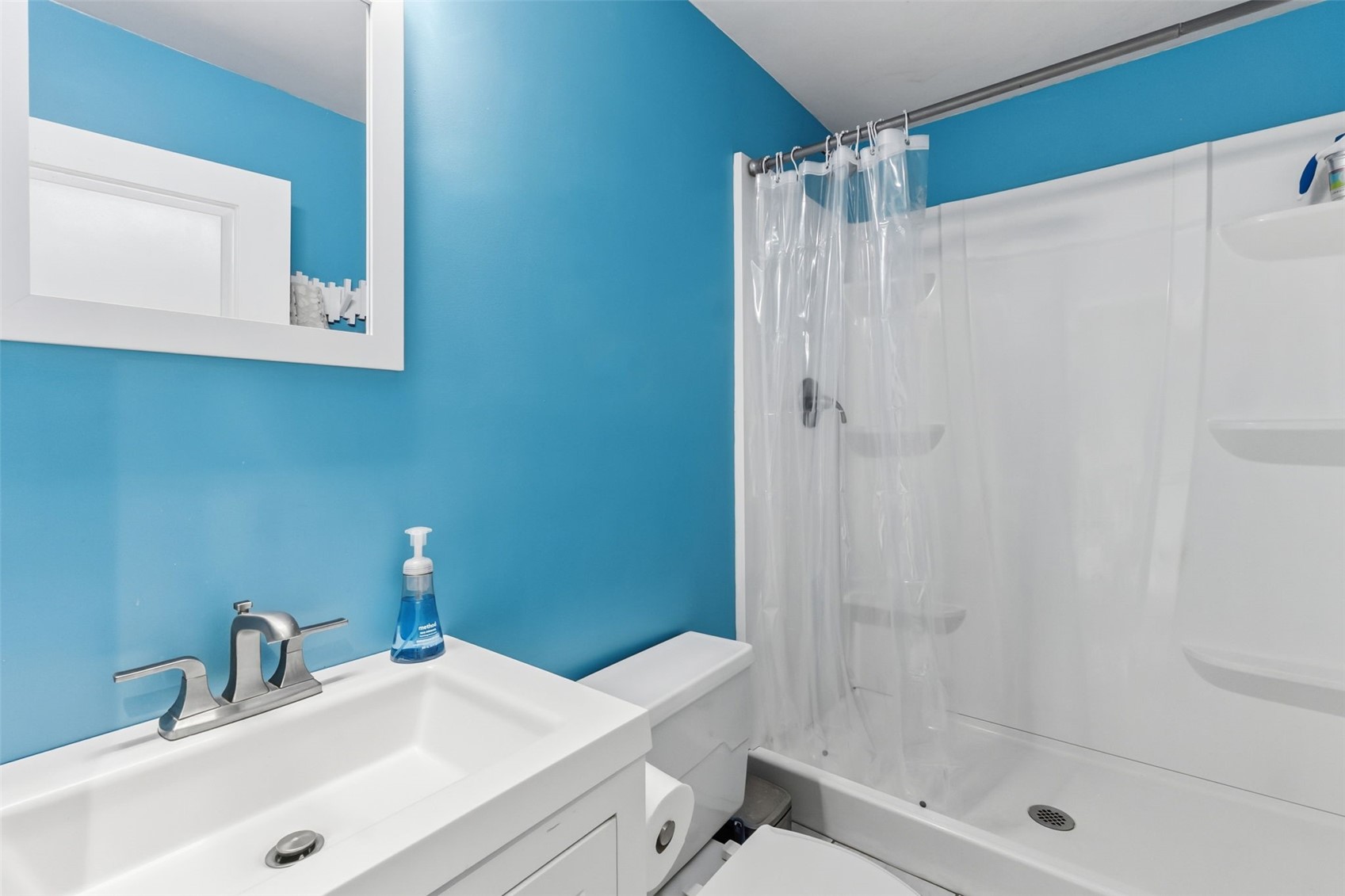 860 Copper Road, Unit 105 Copper Mountain, CO 80443 - Photo 15 of 27 a bathroom with a sink and a mirror