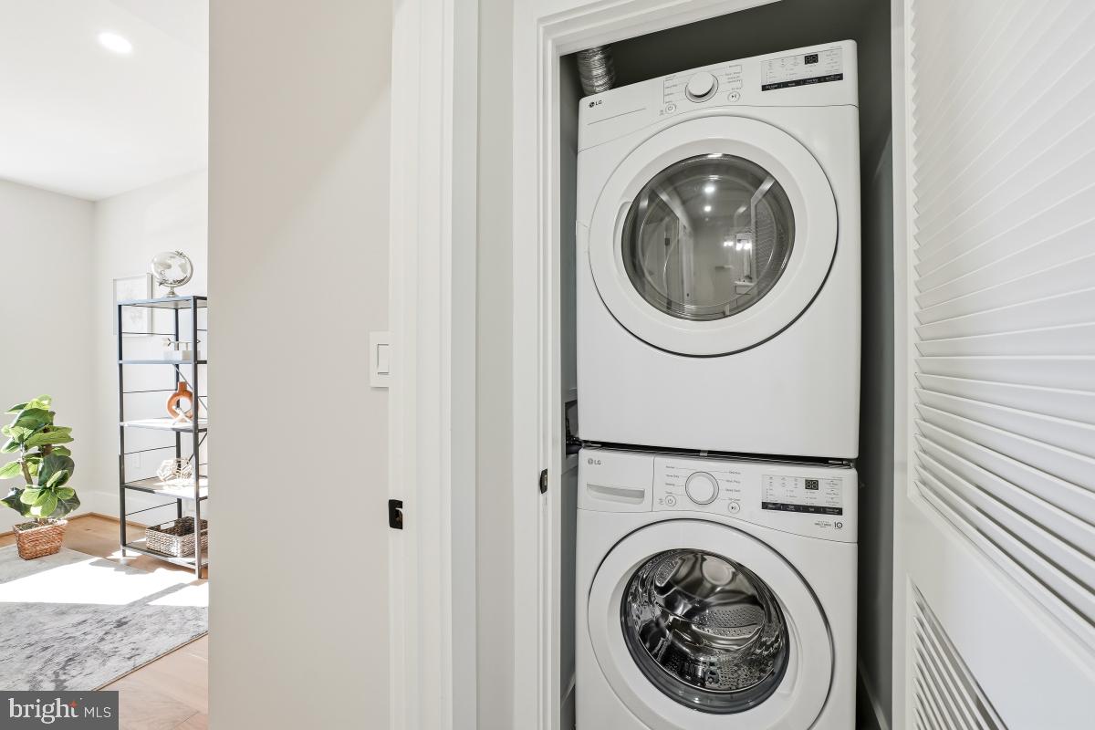 1621 D Street Northeast Washington, DC 20002 - Photo 17 of 31 a view of a hallway with washer and dryer