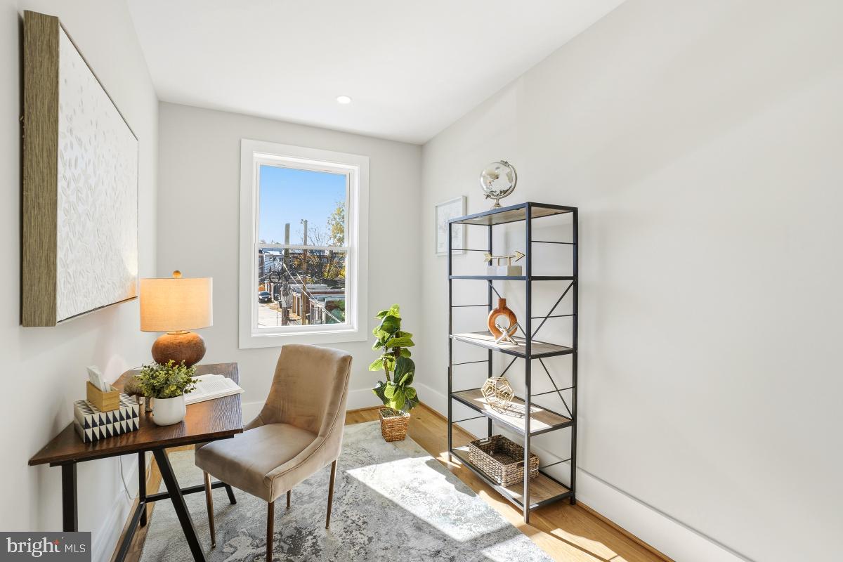 1621 D Street Northeast Washington, DC 20002 - Photo 19 of 31 a view of a workspace with furniture