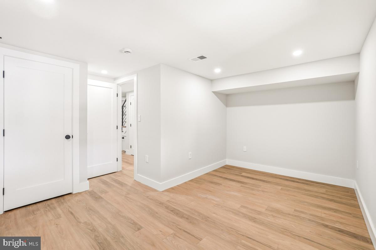 1621 D Street Northeast Washington, DC 20002 - Photo 28 of 31 a view of a room with wooden floor