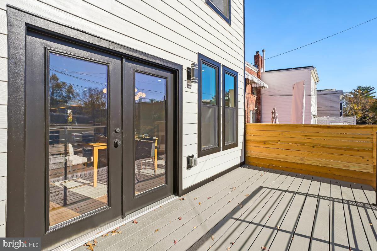 1621 D Street Northeast Washington, DC 20002 - Photo 29 of 31 a view of a balcony with wooden floor