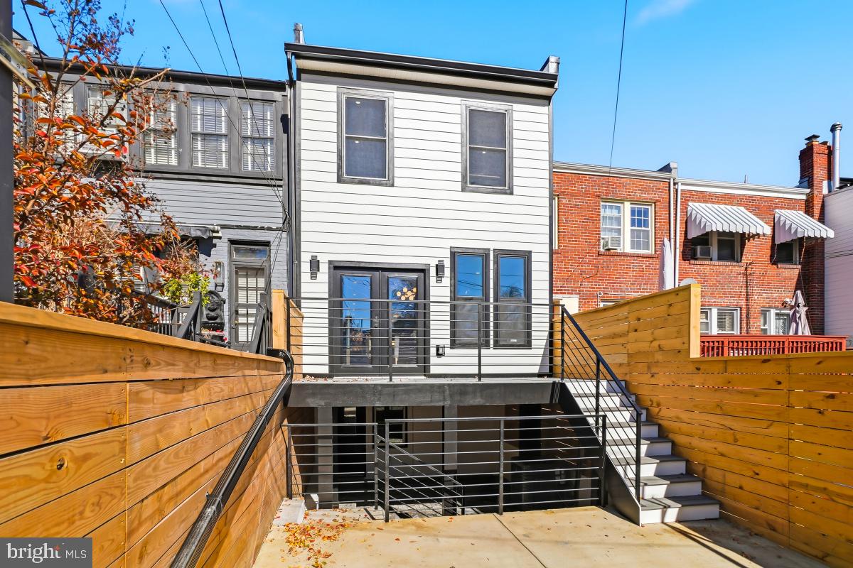 1621 D Street Northeast Washington, DC 20002 - Photo 31 of 31 a view of a balcony with wooden floor and large windows